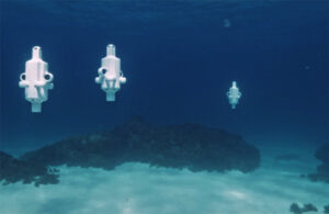 Three Hydrus AUVs underwater.